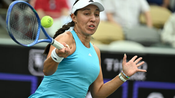 Back Against Wall, Top Seed Pegula Rallies for QF Berth