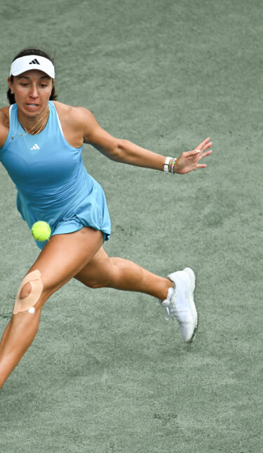 Back Against Wall, Top Seed Pegula Rallies for QF Berth